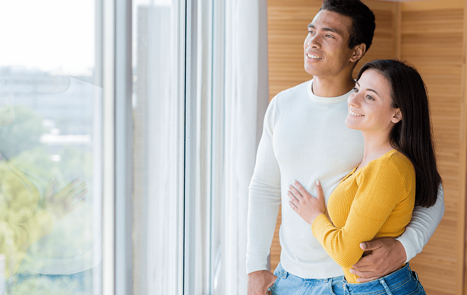 young couple as new condo owners